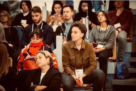 Maria at a conference panel